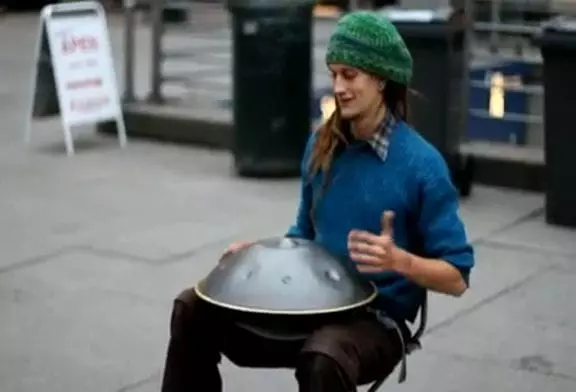 Street musician with unbelievable instrument