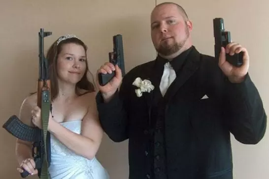 wedding couple with guns