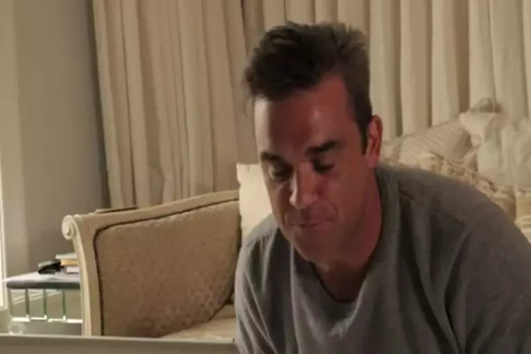 Robbie williams chante 