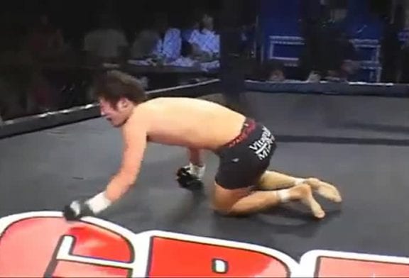 Mma backflip fail off the cage