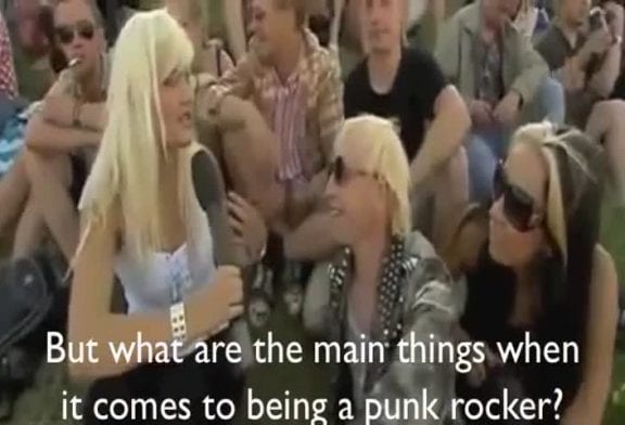 Punk rocker flashes reporter s boobs on live tv