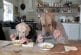 Two dogs dining