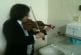 Jouer du violon avec un robinet